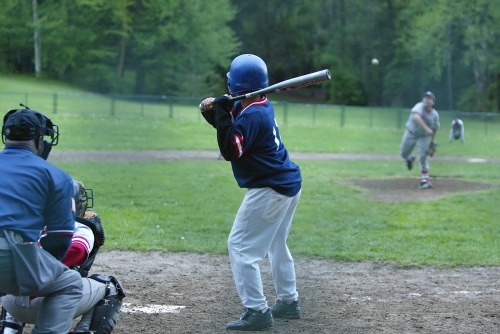 child-playing-baseball