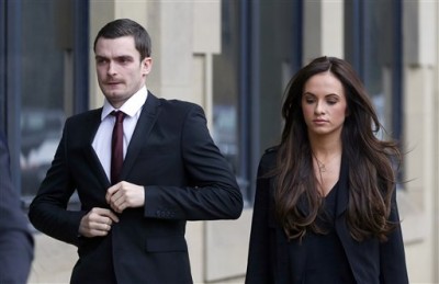 Former Sunderland and England soccer player Adam Johnson, 28, arrives with partner Stacey Flounders at Bradford Crown Court, in Bradford, England, Friday Feb. 12, 2016, where he will stand trial accused of sexual activity with a child.  Johnson has pleaded guilty to grooming and sexual activity with a 15-year-old girl, but denies two further counts of sexual activity with a child. Johnson was fired by Premier League team Sunderland on Thursday. (Owen Humphreys / PA via AP) UNITED KINGDOM OUT - NO SALES - NO ARCHIVES